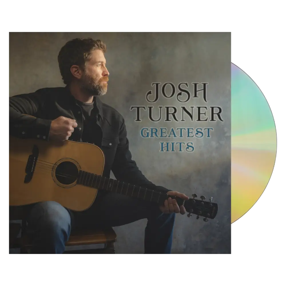 Album cover for Josh Turner’s ’Greatest Hits’ featuring a man holding an acoustic guitar.