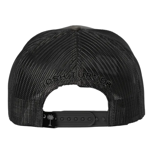 Black mesh trucker hat with ’josh turner’ embroidered across the back and a small south carolina palmetto tree logo on the adjustable strap.