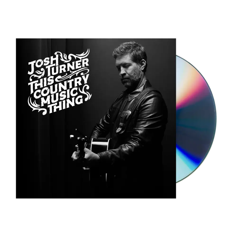 Album cover featuring a black and white photo of a man holding a guitar, with the artist and album title text overlaid.