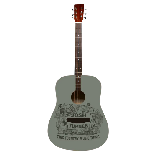 Illustrated acoustic guitar with text and country music-themed drawings on the body, predominantly in gray tones, with a signature at the bottom.