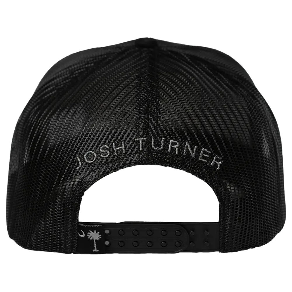 Black mesh trucker hat with ’josh turner’ embroidered in white thread across the back and a small white palm tree logo on the adjustable strap.