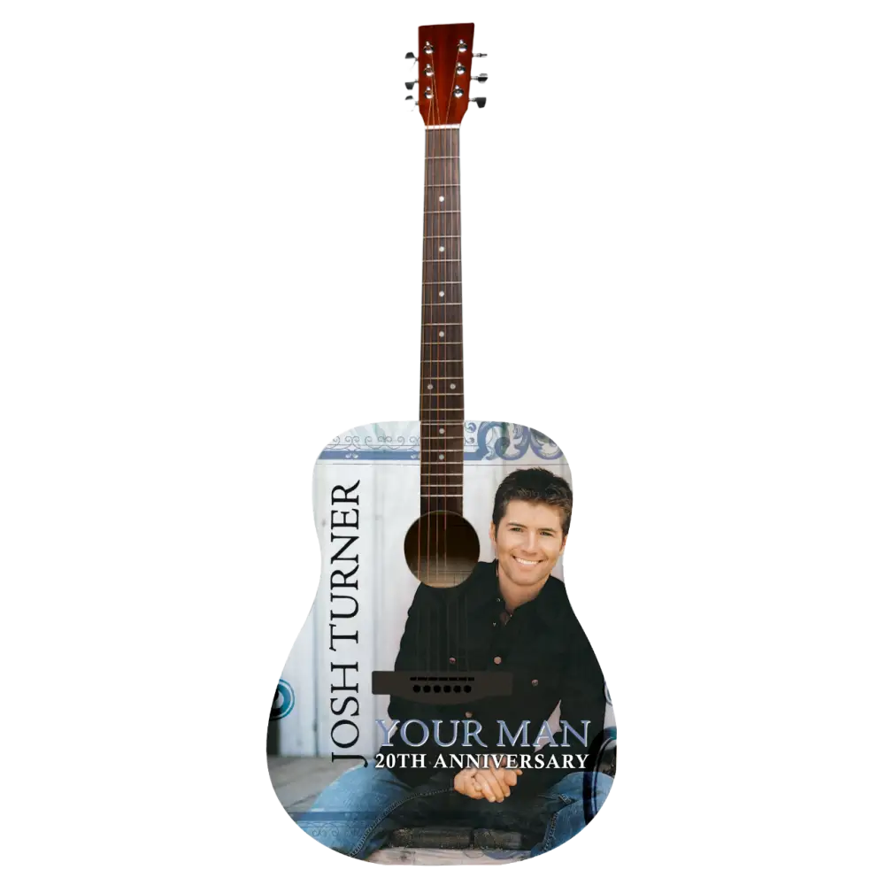 Acoustic guitar with a personalized design featuring a person and text on a white background