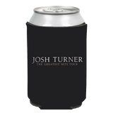 Black foam drink koozie with ’Josh Turner The Greatest Hits Tour’ printed on it.