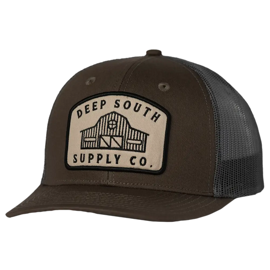 Trucker-style baseball cap with a ’Deep South Supply Co.’ patch on the front.