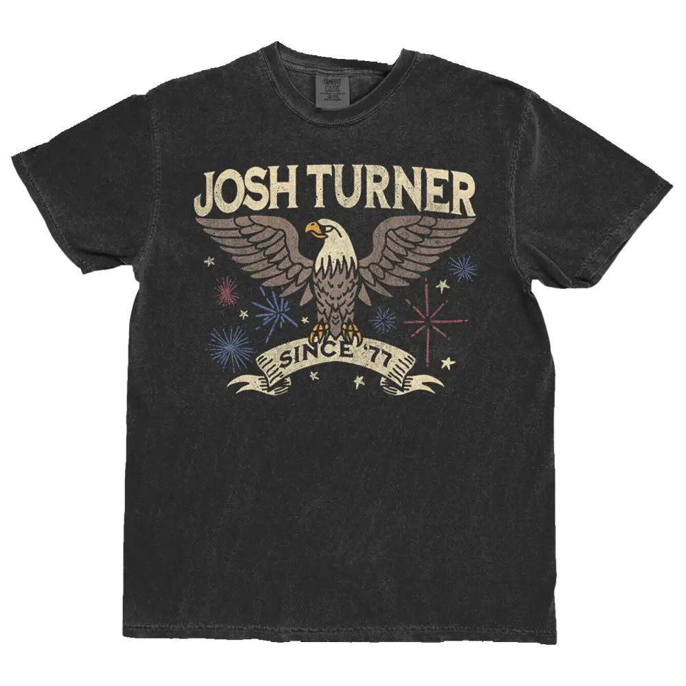 Black distressed cotton t-shirt featuring a vintage-style graphic of an eagle with ’josh turner’ and ’since ’77’’ printed above and below in cream-colored lettering.