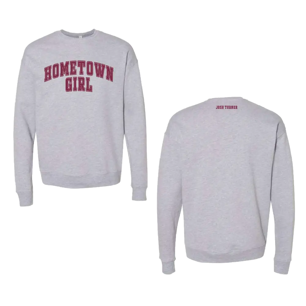 Heather gray sweatshirt with ’hometown girl’ in maroon arched lettering across the chest and ’josh turner’ embroidered in small maroon text at the neckline.