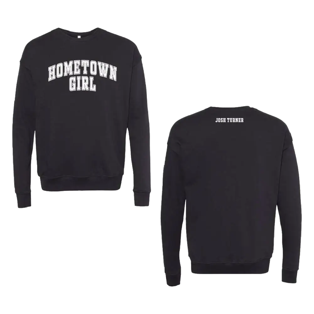 Black long-sleeved sweatshirt with ’hometown girl’ in white arched lettering across the chest and ’josh turner’ printed on the back.