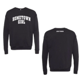 Black long-sleeved sweatshirt with ’hometown girl’ in white arched lettering across the chest and ’josh turner’ printed on the back.