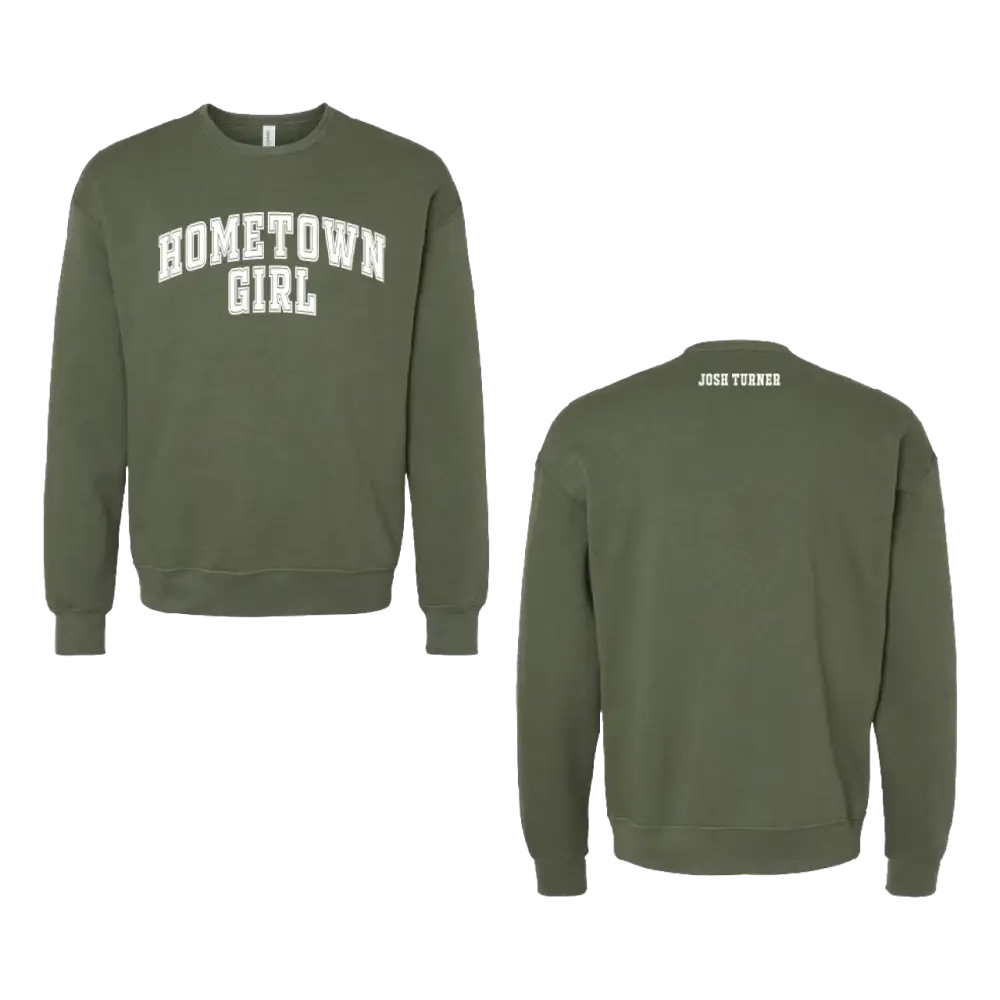 Olive green crewneck sweatshirt with ’hometown girl’ in white arched lettering across the chest and ’josh turner’ printed on the back neck.