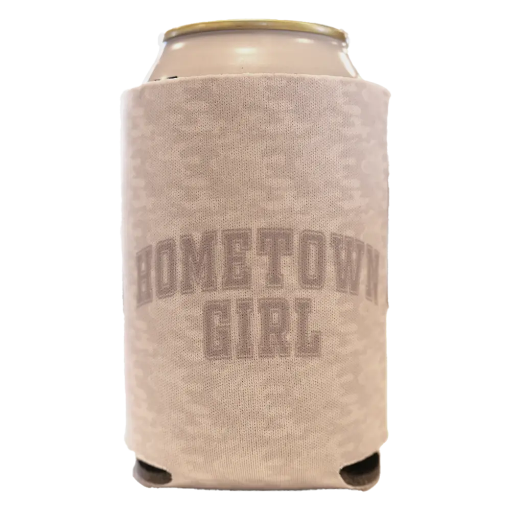 Beige textured fabric can cooler with ’hometown girl’ printed in a matching tone.