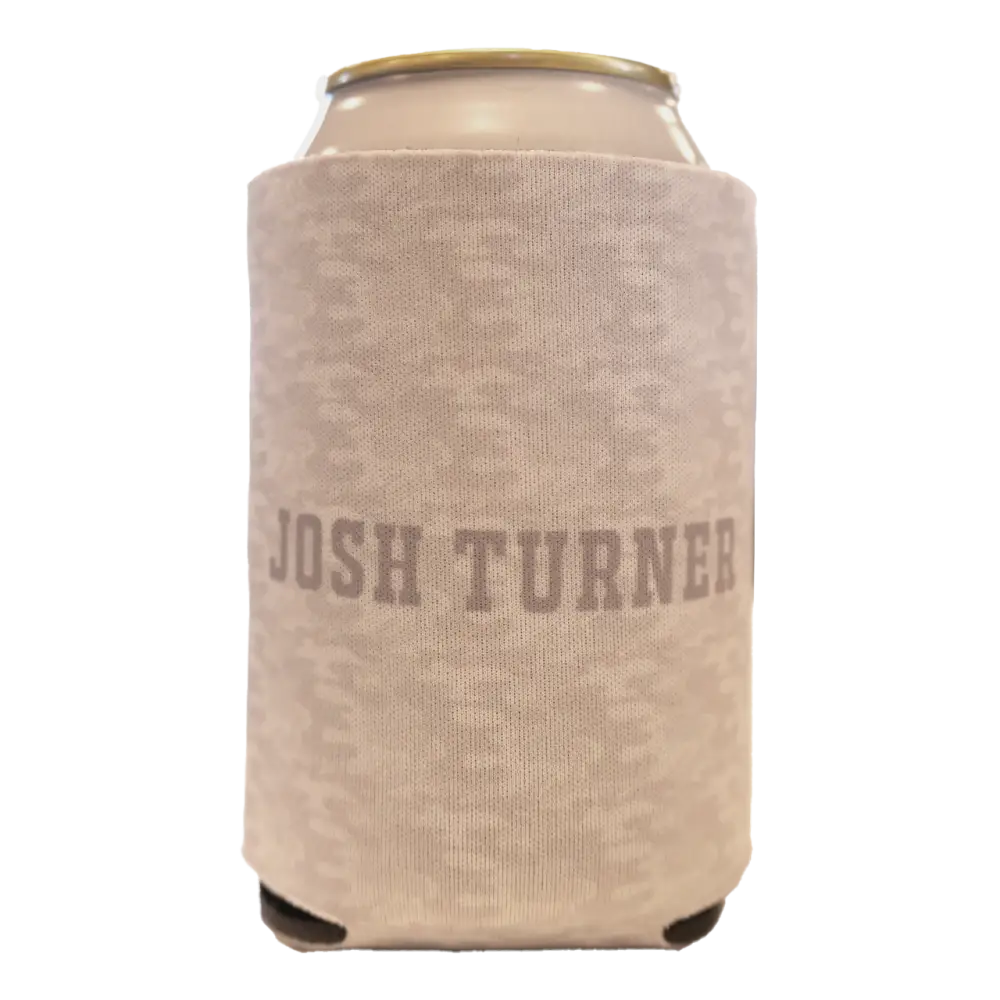 Beige knit can cooler with ’josh turner’ printed in muted gray lettering.