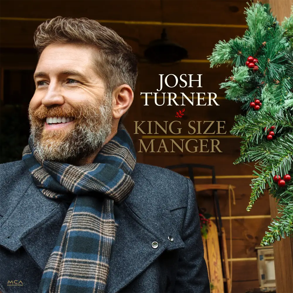 Album cover featuring a smiling man with a beard wearing a coat and scarf, with Christmas greenery visible.