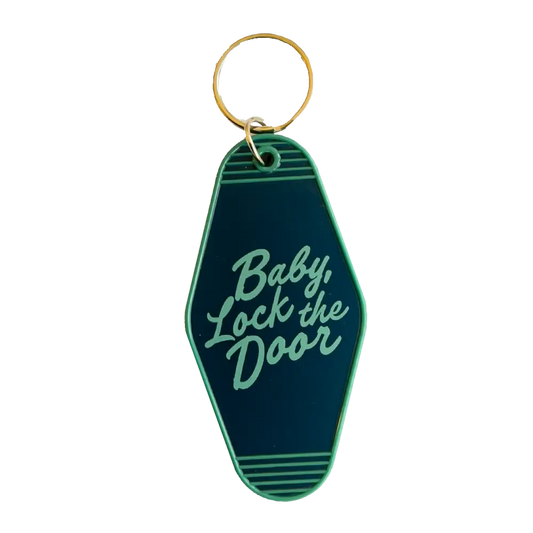 Retro-style green keychain tag with ’Baby Lock the Door’ text.