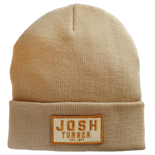 Beige knit beanie with a ’Josh Turner’ patch on the folded brim.
