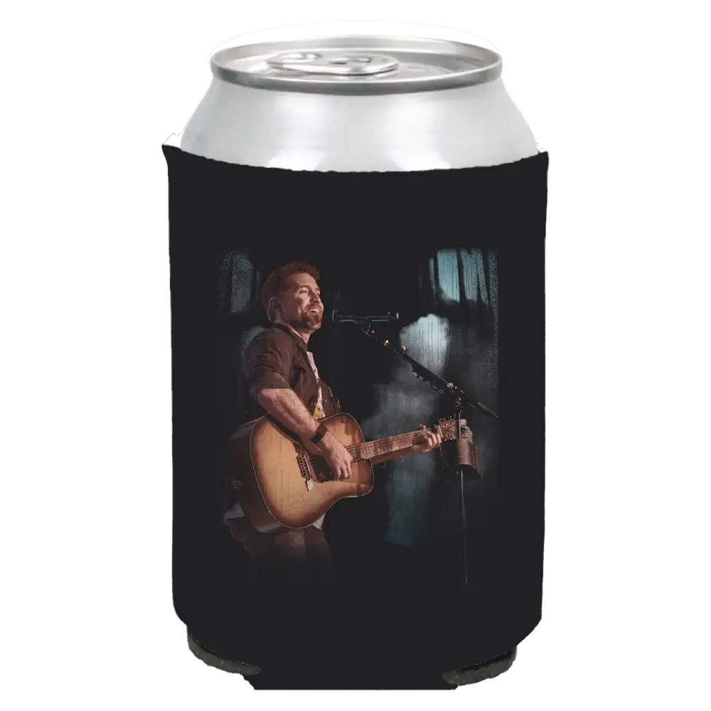 Black foam drink cooler sleeve with an image of a musician performing on stage printed on it.