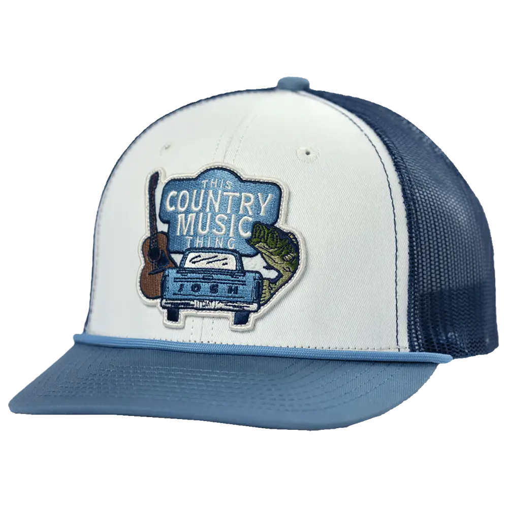 White and navy blue trucker hat featuring an embroidered patch with a guitar, vintage pickup truck, and fish design.
