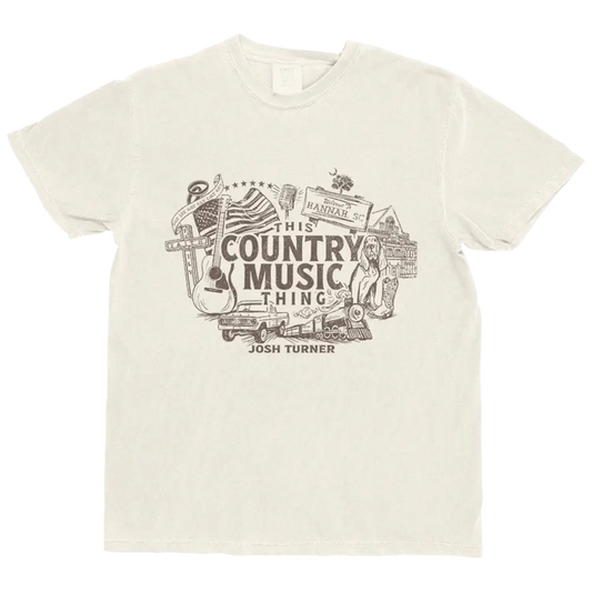 Cream-colored cotton t-shirt featuring a detailed black ink graphic of country music-themed icons including an american flag, guitar, vintage car, and train.