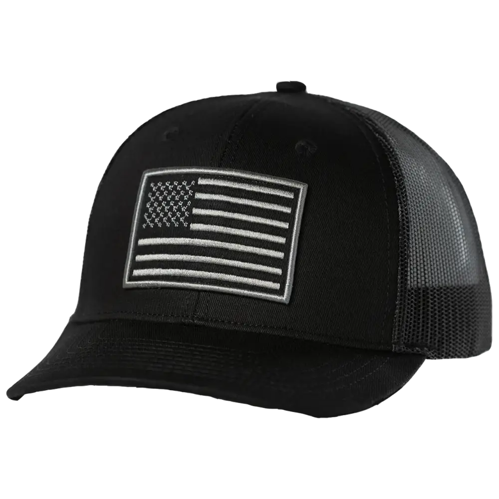 Black trucker hat with a white embroidered american flag patch on the front.