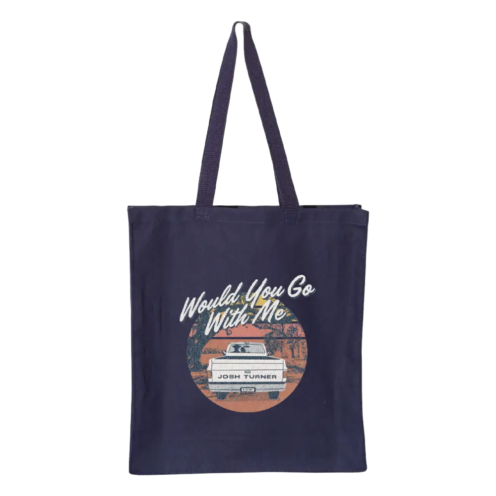 Navy blue tote bag with a retro-style graphic design featuring a camper van and text.