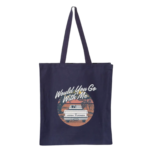 Navy blue tote bag with a retro-style graphic design featuring a camper van and text.