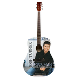 Acoustic guitar with a personalized design featuring a person and text on a white background