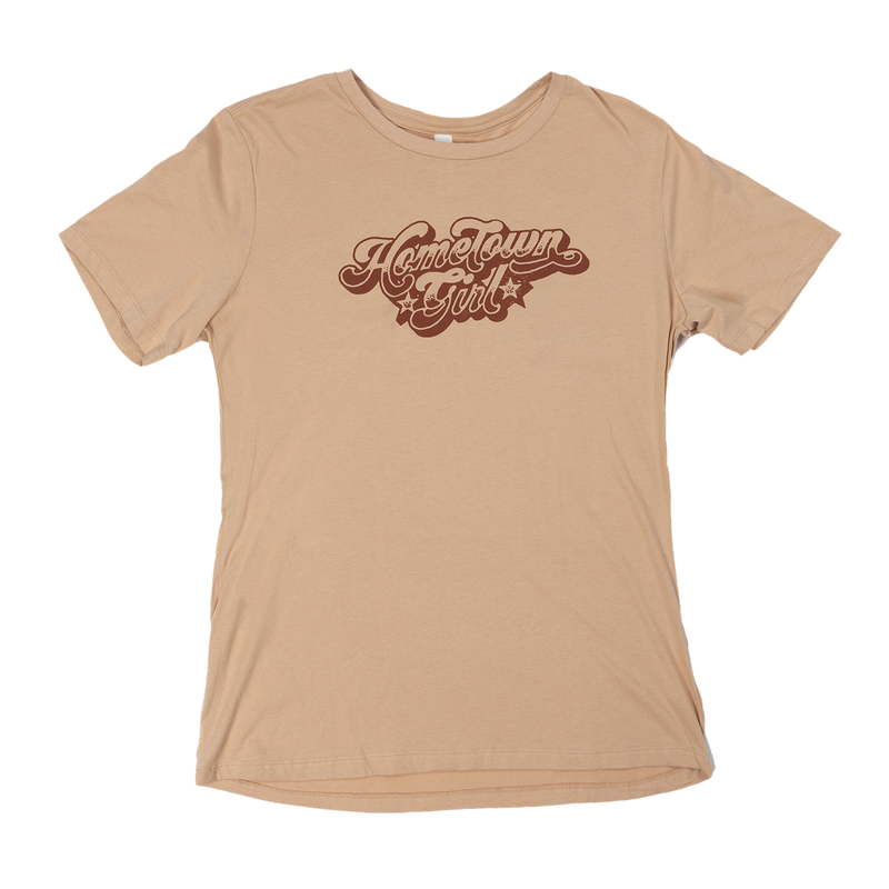 Beige t-shirt with ’Have a Town Girl’ text printed in brown cursive lettering.